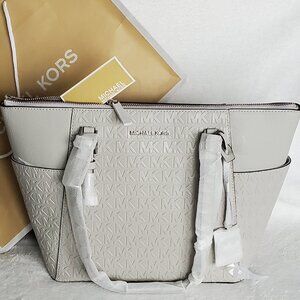 NWT- Michael Kors "Charlotte" Monogram Tote Bag  Color: Aluminum W/Dust Bag
